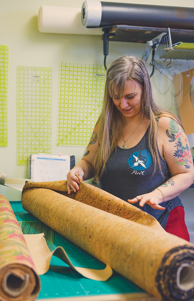 a person holding a roll of paper