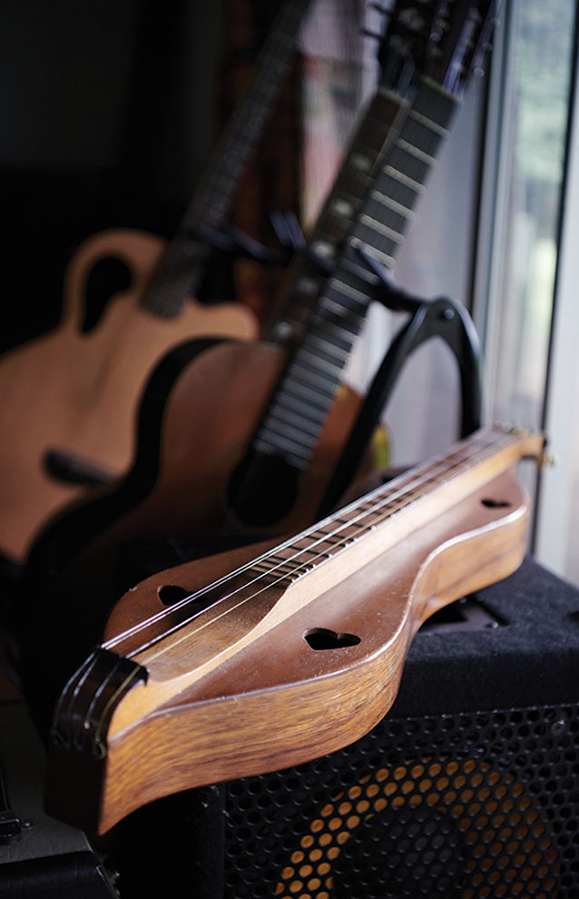 a guitar next to a guitar