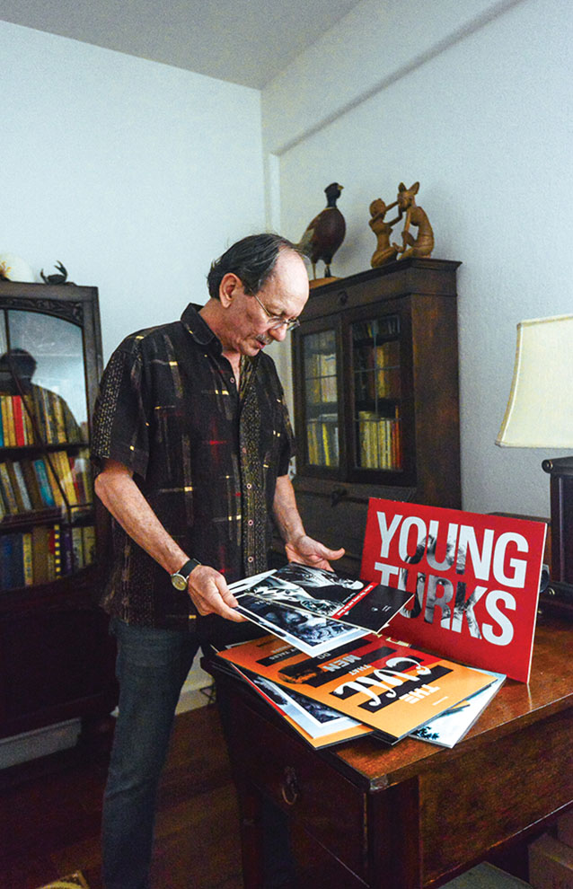 a person looking at a magazine