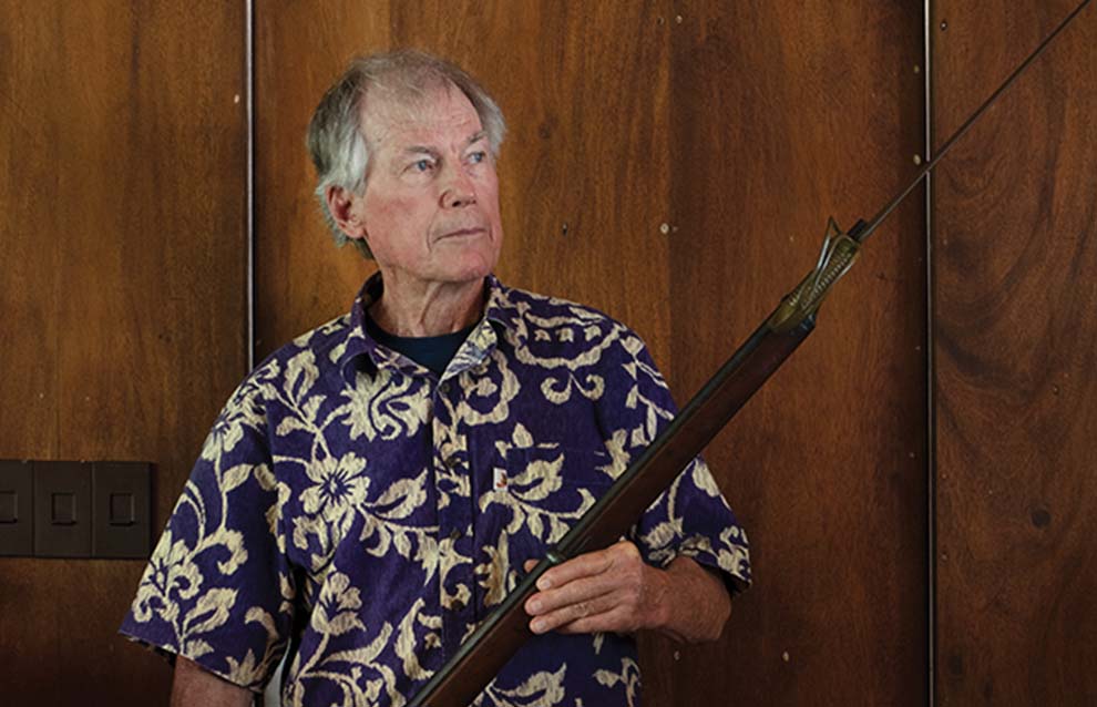 a person holding a rifle