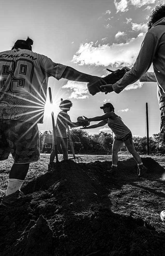 a group of people in dirt